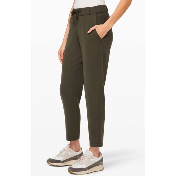 Lululemon Pants - Lululemon On the Fly 7/8 Pant Drawstring Woven Dark Olive Women's 4
